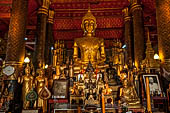 Luang Prabang, Laos - Wat Mai, detail of the Buddha altar inside the sim. 